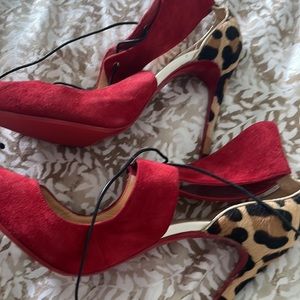 Louboutin red bottoms barely worn!